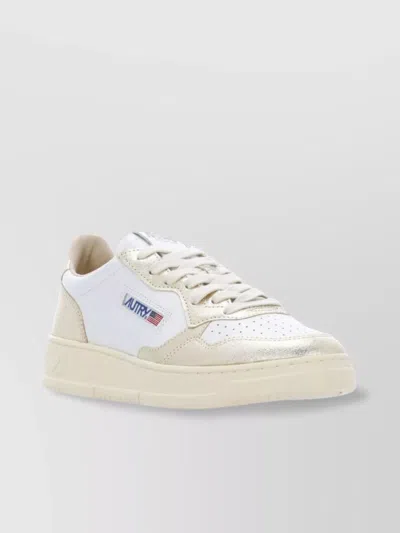 Autry Low Top Leather Sneakers With Metallic Accents In White