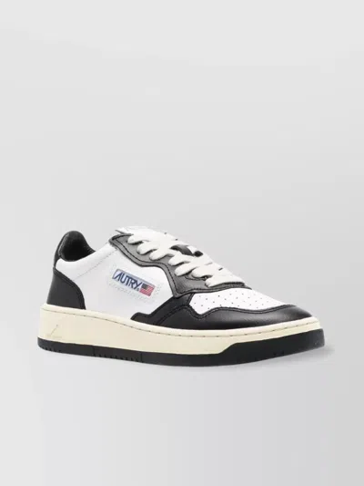 Autry Low Top Leather Sneakers With Perforated Toe In Black Leather