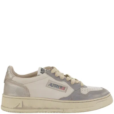 Autry Low-top Leather Sneakers With Vintage Effect In Neutral