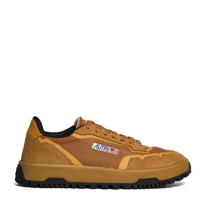 Autry Low-top Sneakers With Cushioned Sole And Rugged Outsole In Brown
