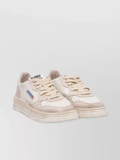 Autry Low-top Sneakers With Perforated Toe And Textured Heel In White