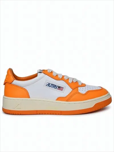 Autry Low-top Sneakers With Vibrant Orange Overlays And Perforated Detailing