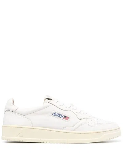 AUTRY AUTRY LOW-TOP WHITE LEATHER SNEAKERS WITH PERFORATED DETAILING