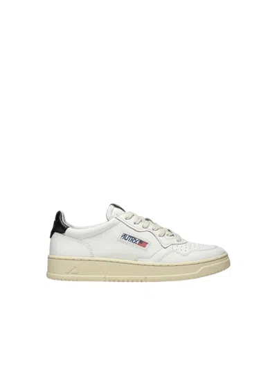AUTRY AUTRY MEDA LOWLIST MAN – BLACK AND WHITE LEATHER SNEAKERS