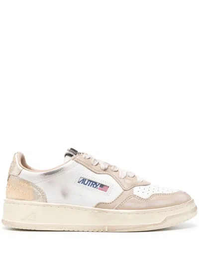 Autry Medalist Distressed Leather Sneakers In White/gold