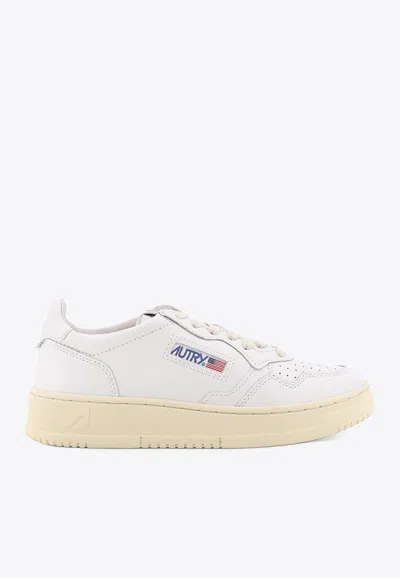 Autry Low-top Sneakers With Contrast Sole And Perforated Detailing In White