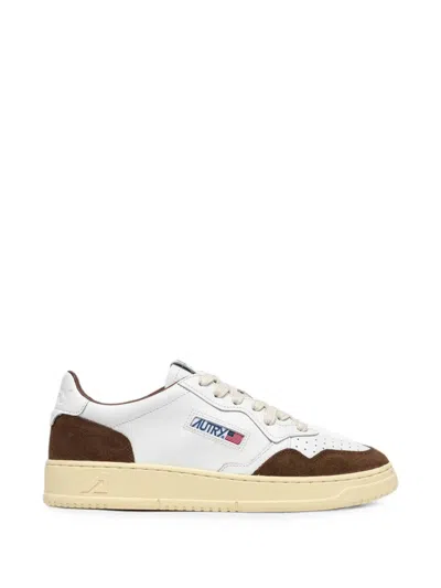 Autry Low-top Sneakers With Streamlined Silhouette And Timeless Appeal In White