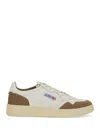Autry Low Sneaker With Suede Accents And Perforated Toe Box In Neutral