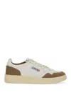 Autry Low Sneaker With Suede Accents And Perforated Toe Box In Neutral