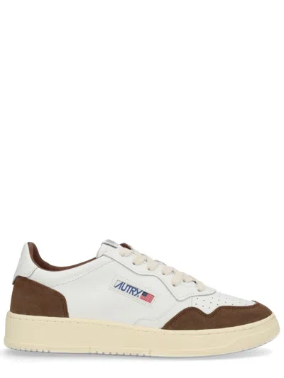 Autry Low-top Sneakers With Streamlined Silhouette And Timeless Appeal In White