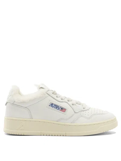 Autry Low-top Sneakers With Contrast Sole And Perforated Detailing In White