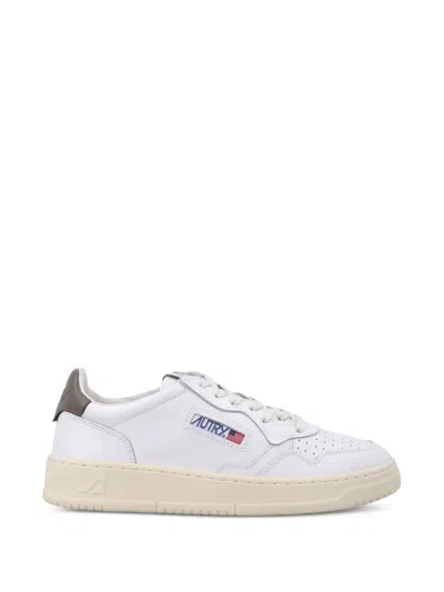 Autry Low-top Sneakers With Perforated Detailing And Contrasting Heel Tab In White