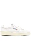 Autry Low Sneaker With Perforated Detailing And Rubber Sole In White