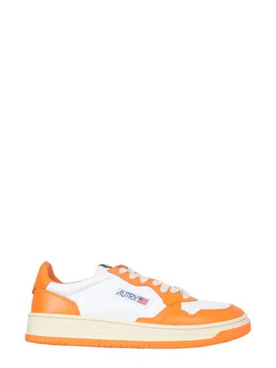 Autry Medalist Low Sneakers In White Orange