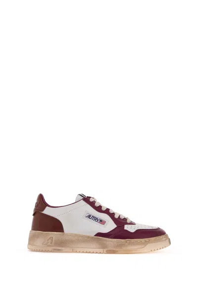 AUTRY AUTRY MEDALIST LOW SUPER VINTAGE SNEAKERS IN WHITE/PURPLE LEATHER