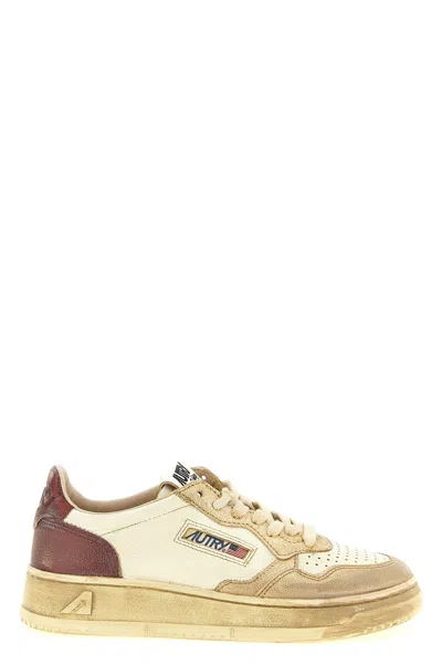 Autry Super Vintage Medalist Low Sneakers In In White, Red And Gold Leather