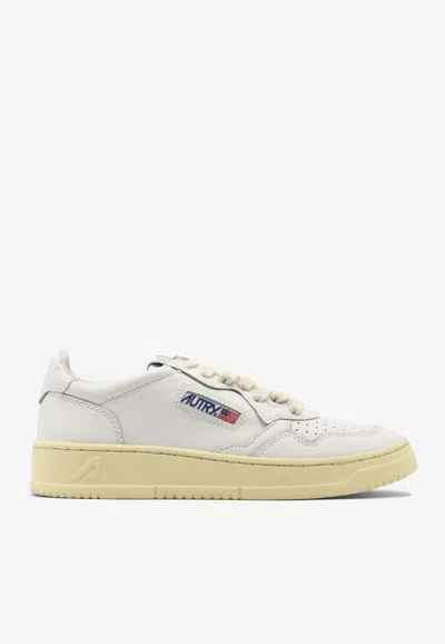 Autry Low-top Sneakers With Contrast Sole And Perforated Detailing In White
