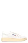 Autry Low-top Sneakers With Contrast Sole And Perforated Detailing In White