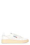 Autry Low-top Sneakers With Contrast Sole And Perforated Detailing In White