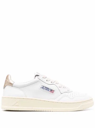 AUTRY MEDALIST LOW WHITE AND GOLD LEATHER SNEAKERS AUTRY WOMAN