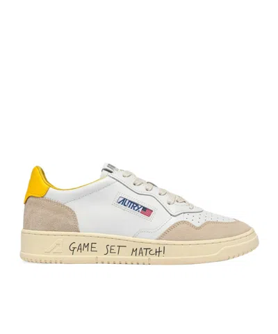 Autry Medalist Low Sneakers In White Leather And Slicker Suede In Gold