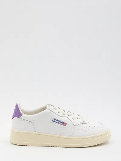 Autry Low-top Perforated Leather Sneakers With Contrasting Heel Tab In White