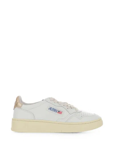 Autry Leather Sneakers With Round Toe And Metallic Heel Tab In White