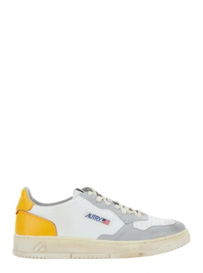 AUTRY AUTRY MULTICOLOR LOW TOP SNEAKER VINTAGE EFFECT IN LEATHER