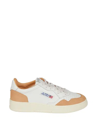 Autry Perforated Leather Sneakers In White