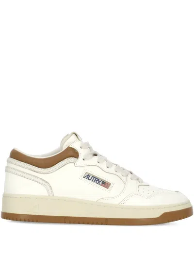 Autry Perforated Platform Leather Sneakers In White