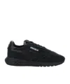 Autry Reelwind Black Low Top Sneakers With Logo Patch Ontongue And Side In Suede Man