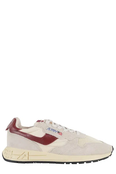 Autry Reelwind Beige Low Top Sneakers With Logo Patch Ontongue And Side In Suede Man