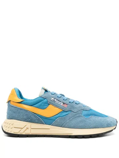 Autry Retro Aesthetic Sneakers With Cushioned Sole And Prominent Logo In Blue