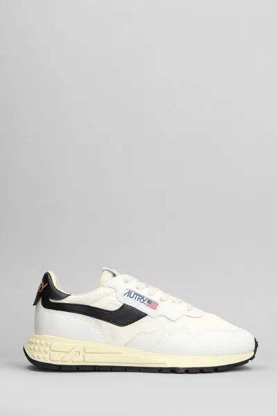 AUTRY REELWIND LOW SNEAKERS IN WHITE LEATHER AND FABRIC