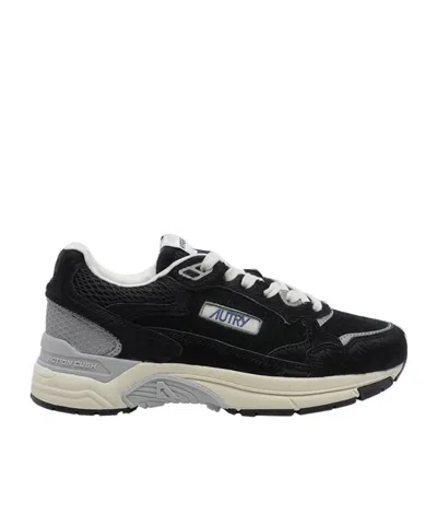 Autry Hyperway Panelled Leather Sneakers In Black