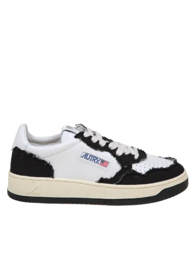 Autry Sneakers In Black And White Leather And Canvas In Grey