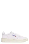Shop Autry Sneakers In White
