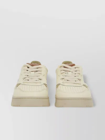 Autry Sneakers With Contrasting Heel Tab And Perforated Toe