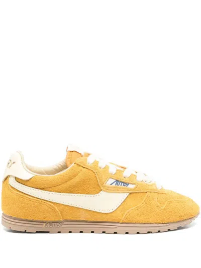 AUTRY AUTRY SUEDE SNEAKERS IN YELLOW