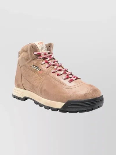 Autry Smooth Leather Ankle Boots With Padded Collar And Textured Finish In Brown