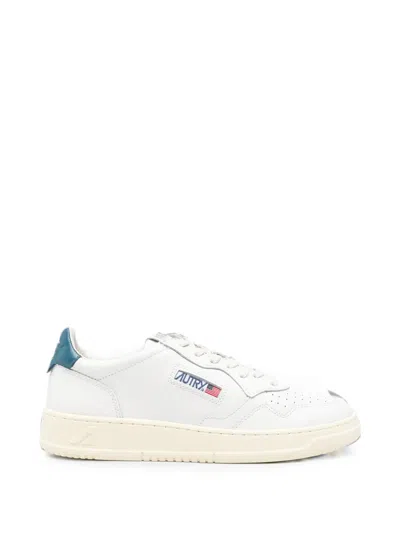 Autry Stylish Sneakers With Multi-textured Inserts And Perforated Toe In White