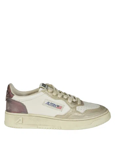 Autry Sup Vint Low Sneakers In Yellow