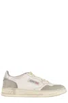 Autry Vintage Leather Sneakers With Pointed Toe And Signature Heel In Neutral