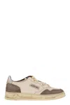 Autry Low Top Sneakers With Contrasting Leather Inserts In White