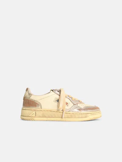 Autry 'supervintage Low' Ivory Leather Sneakers In Gold