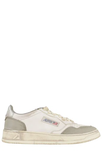 Autry Vintage Leather Sneakers With Pointed Toe And Signature Heel In Neutral