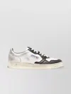 Autry Vintage Low Top Sneakers For Men In Neutral