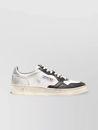 Autry Vintage Low Top Sneakers For Men In Neutral