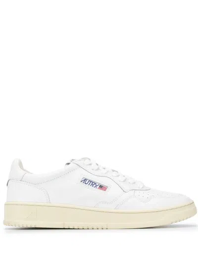 AUTRY WHITE LEATHER SNEAKERS WITH PERFORATED DETAILING