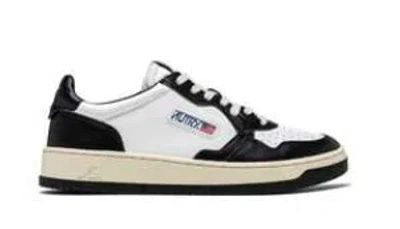 AUTRY AUTRY WHITE LEATHER SNEAKERS WITH PERFORATED DETAILING